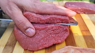 Steak with fresh bread. I cook steak on charcoal, delicious and fresh food in nature