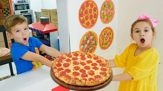 Kids learn how to cook pizza and help each other