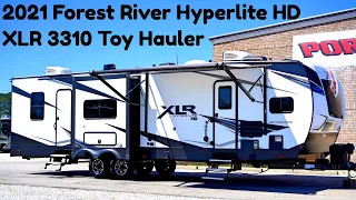 2021 Forest River Hyperlite HD XLR 3310 Toy Hauler Travel Trailer from Porter’s RV Sales - $49,900