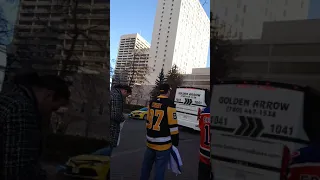 Pittsburgh Penguins fans try to get a Sidney Crosby autograph after practice in Edmonton