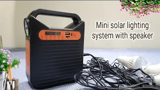 Unboxing of mini solar lighting system with speaker