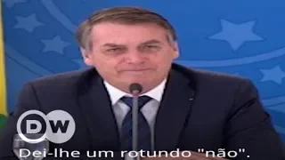 Macron e Merkel não têm "autoridade para discutir desmatamento", diz Bolsonaro