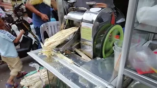 Making sugar cane drink in Phnom Penh Cambodia || @KhmerStreets