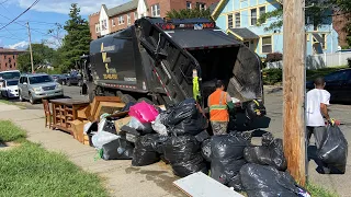 Mack MRU Loadmaster Garbage Truck Packing a Massive Bulk Pile