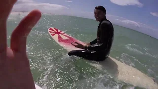 Surfing small waves at Muizenberg beach on a Malibu POV!