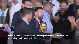 Argentina's World Cup winners return home