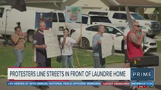 Protesters line streets in front of Laundrie family home