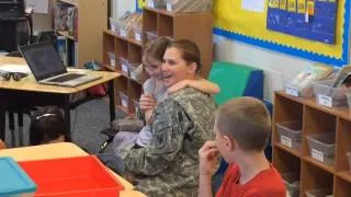 Soldier returns from Mideast deployment to surprise daughter at Chinn Elementary