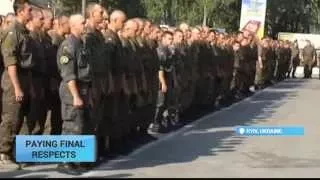 Kyiv Parliament Clashes Remembered: Ukrainian National Guardsmen pay respect to first victim