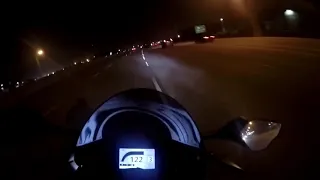 Honda CBR1000RR racing 170mph down dark highway