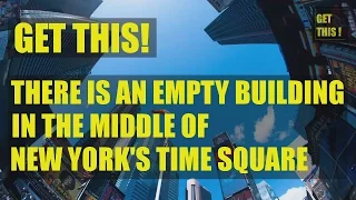 There is an empty building in the middle of New York's Times Square