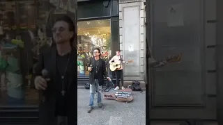 Bono suddenly sings in the center of Dublin during the Pride