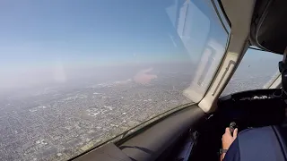 Landing at LAX in a Challenger 300 cockpit view.