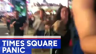 People run for their lives after panic in Times Square