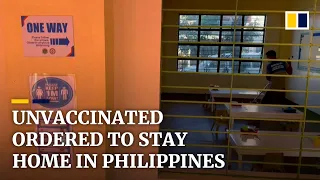 Unvaccinated in the Philippines ordered to stay home under measures to fight Covid-19 case surge