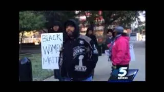 Protestors chant outside courthouse during hearing for OKC police officer