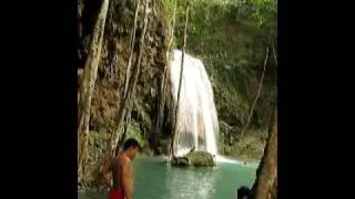 Thailand , Erawan Waterfalls, fish eat skin