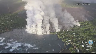 Lava flow from fissure 8 enters Kapoho Bay, breakout at intersection of Railroad Ave and Cinder Rd