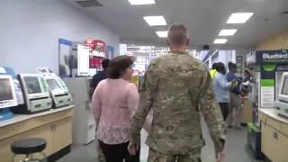 Soldier surprises wife and meets newborn son for the first time