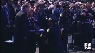 Flag folding ceremony at fallen Officer Katie Thyne's memorial service