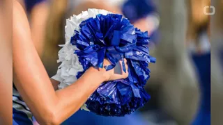 Cheerleading coach forces girl to perform split