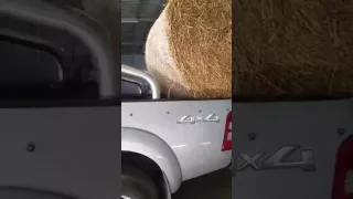 loading a round bale