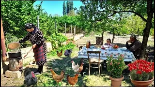 Cooking the Famous Dish Ajapsandal with Meat and Vegetables.