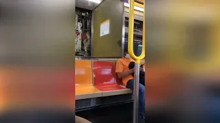 guy gets hit by map in nyc train