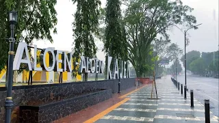 Beautiful Heavy Rain in the village square||country of Indonesia