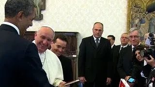President Obama presents gift to Pope Francis