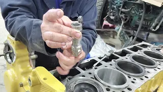 How to install cylinder head included center plate and gasket for 3406B CAT engine?