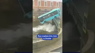 Bus crashes into river in Russia