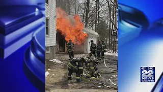 Crews put out garage fire in Springfield