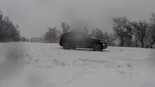 BMW X5 snow drifting