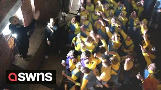 Over 70 people dress as ‘Minions’ and cheer the arrival of leader 'Gru’ at Halloween party | SWNS