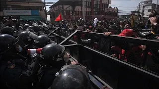 Nepal police fire tear gas as MPs debate US grant | AFP