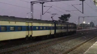 MEMU train slowly enters Prantik Station.