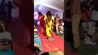 A woman dancing and end up tearing her skirt in public