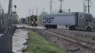 Train barrels down the tracks and slams into a semi trailer