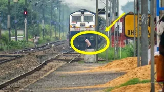 Idiot guy cheating Death in front of high Speed Train !! Indian railways