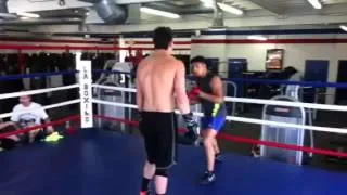 Alejandro Perez champion holding mitts for Craig wilk