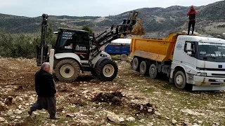 Hidromek 102s ve BMC 827 duvar taşı yükleme