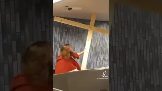Jesus caught on Camera Carrying a Cross on an escalator 😱
