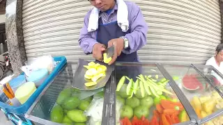 Bangkok vendor knife skills.