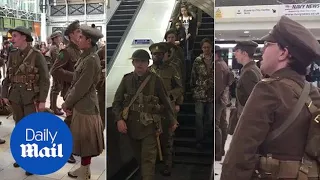 Somme centenary: Men dressed as soldiers sing 'We are here' - Daily Mail