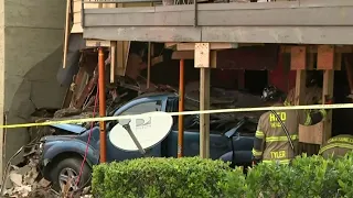 Driver hospitalized after SUV runs off Gulf Freeway, slams into apartment building in southeast ...