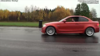 BMW 1M Coupe vs BMW M6 Coupe from a rolling start and from standstill on the wet