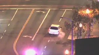 Smoke visible in police chase suspect's car in South LA area