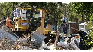 Australia man 'steals bulldozer to crush cars and home'