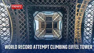 Obstacle course world champion attempts to climb the Eiffel Tower by rope